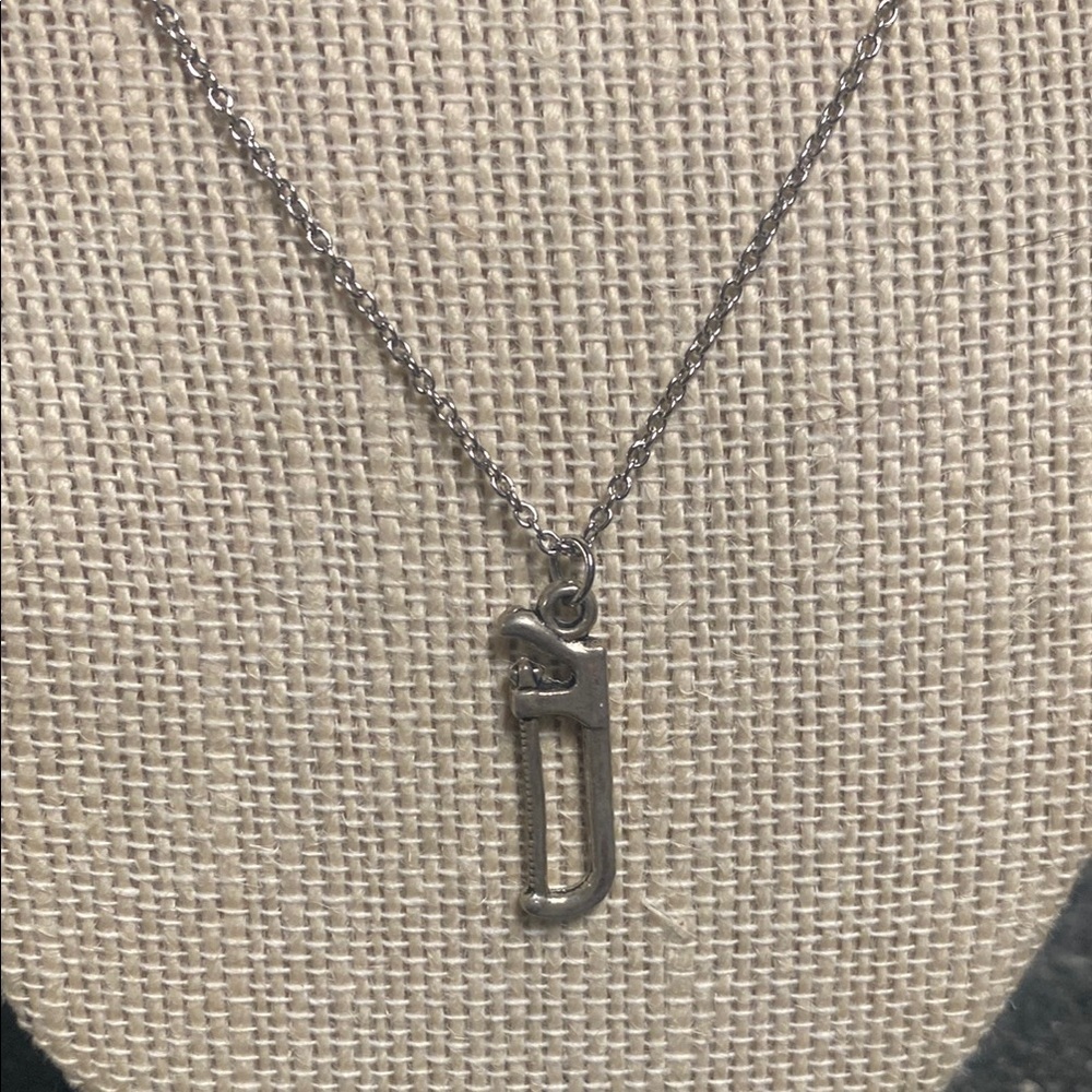 Elegant Silver HandSaw Pendant Necklace